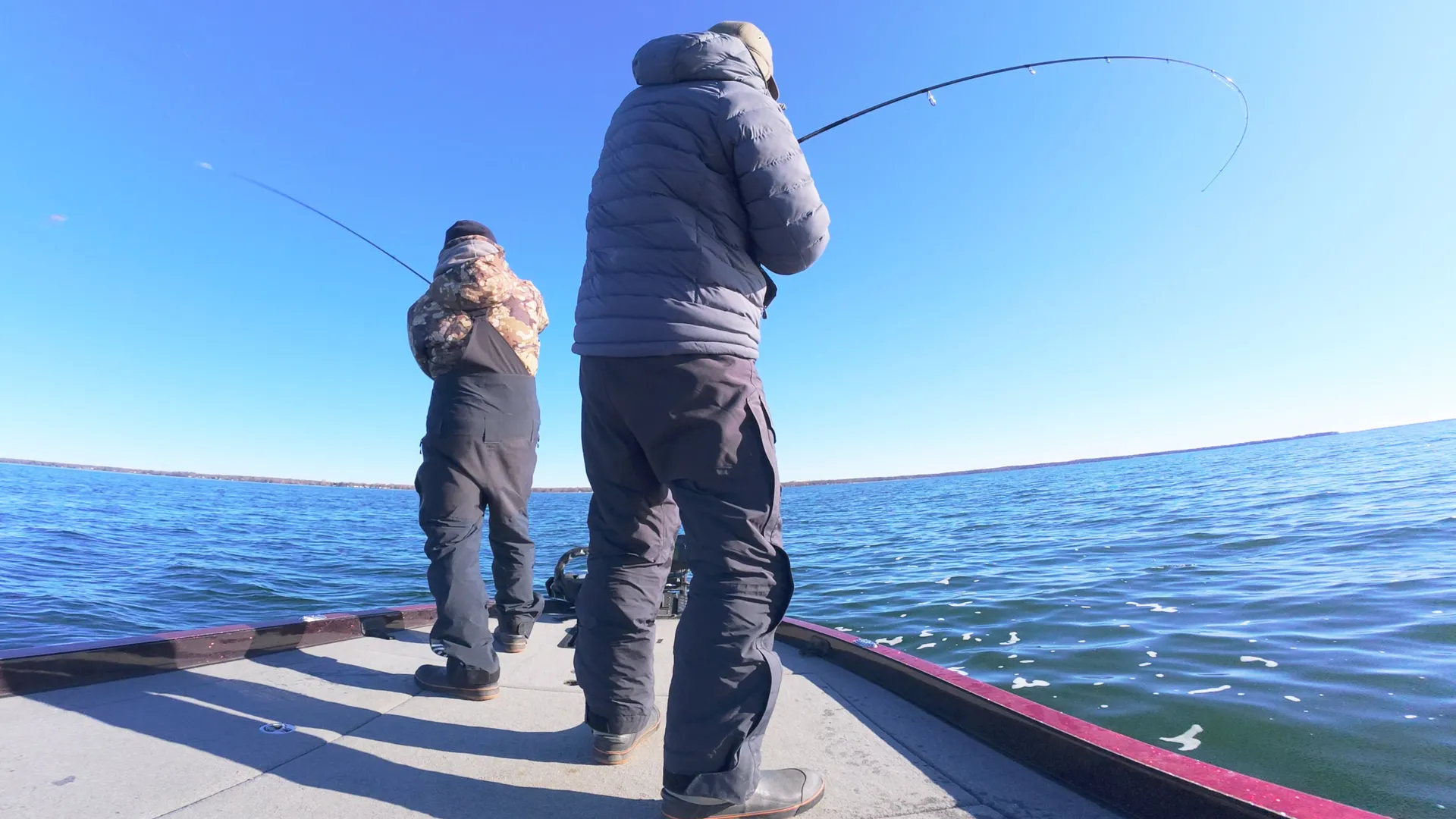 Angler Setting the hook on Mille Lacs Smallmouth