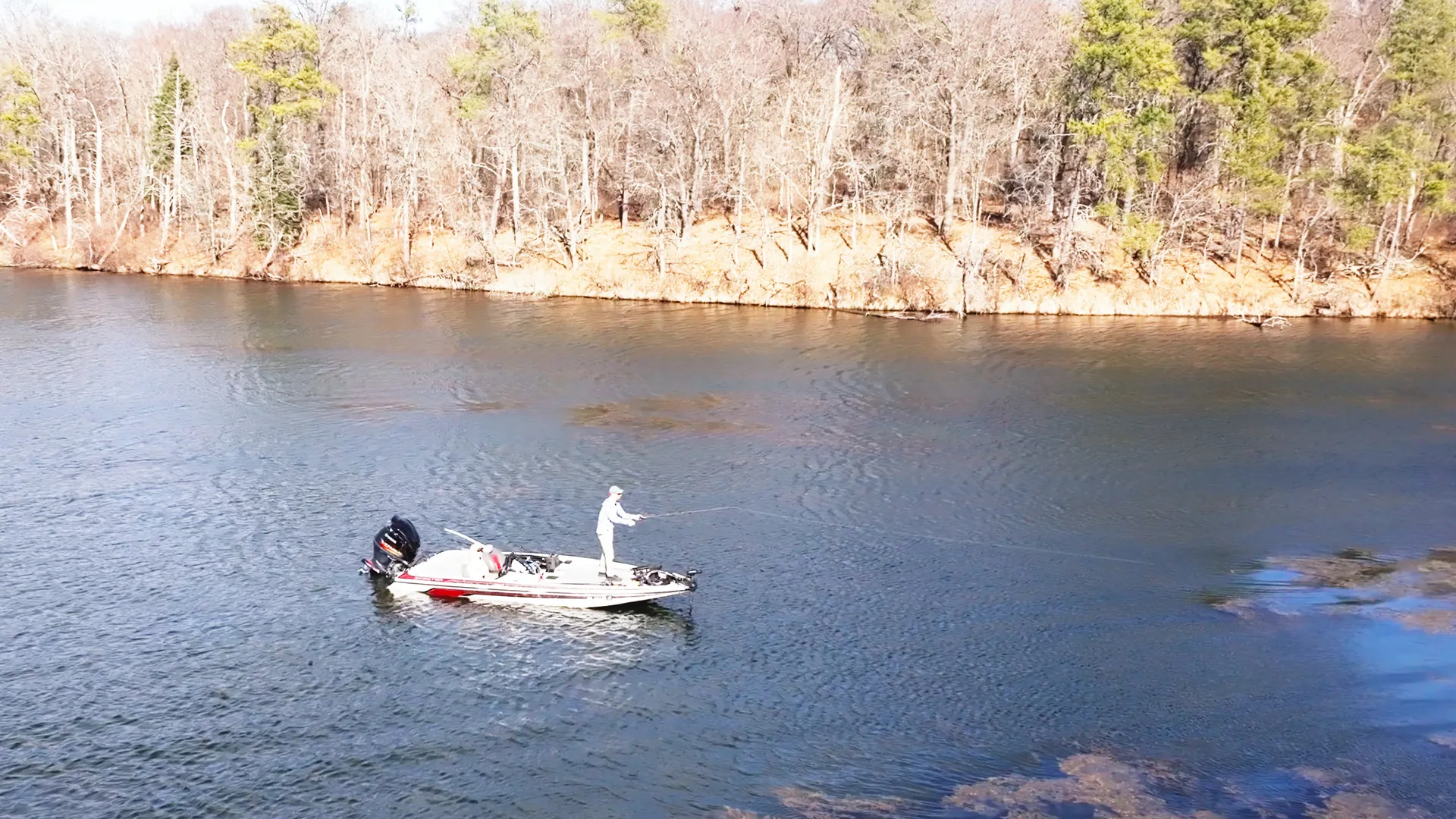 bass angler on the river